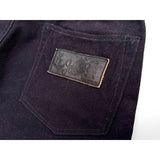 Mister Freedom LOT64 NOS Dark Navy Canvas feature a hand-debossed leather MF® branded patch on rear pocket, black tea-core veg-tan cowhide