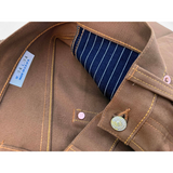 Detail image of pocket lining, interior and button details of the Californian Lot 64 "Frontier" duck edition bottoms
